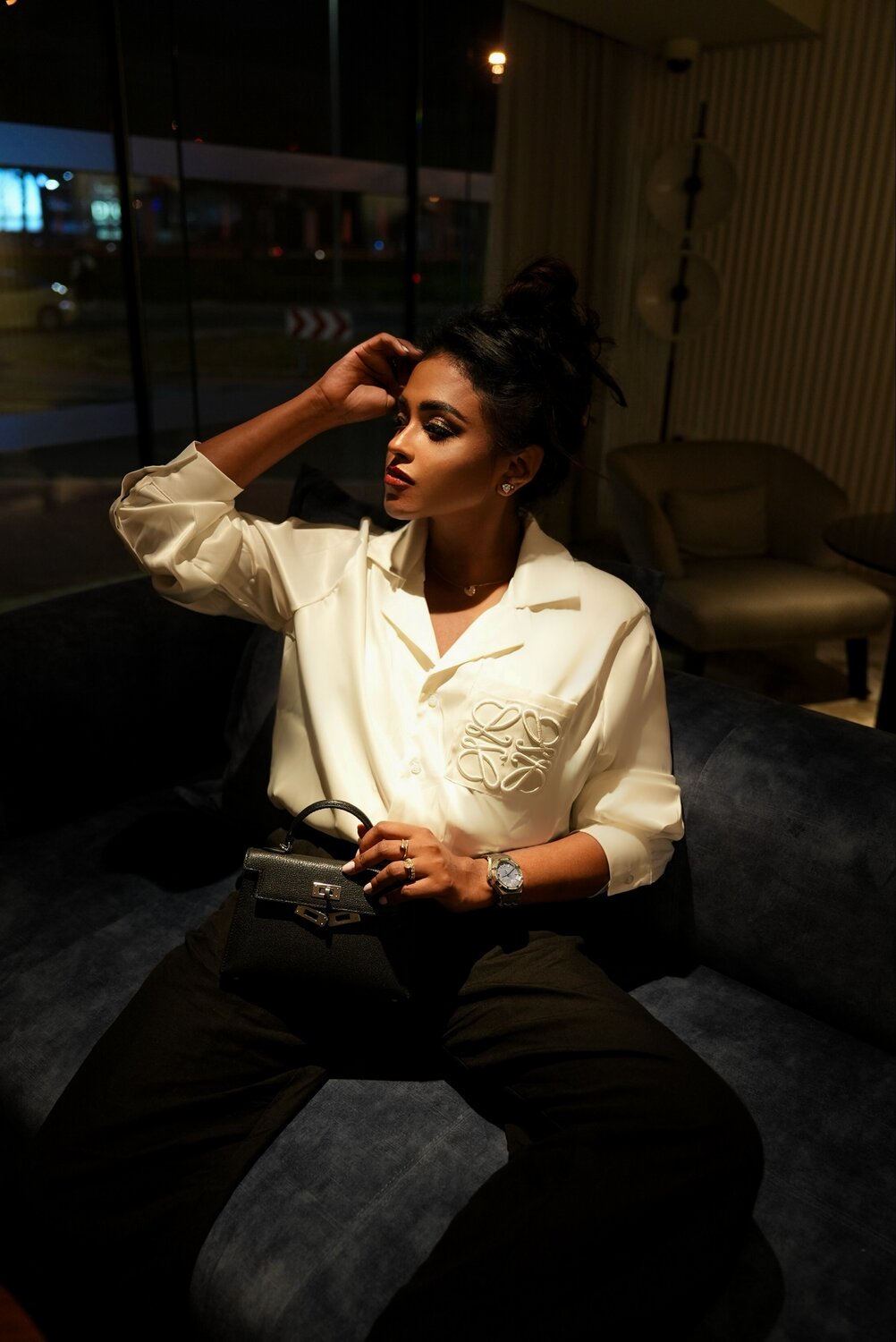 Sachini Dilanka wearing a Loewe shirt