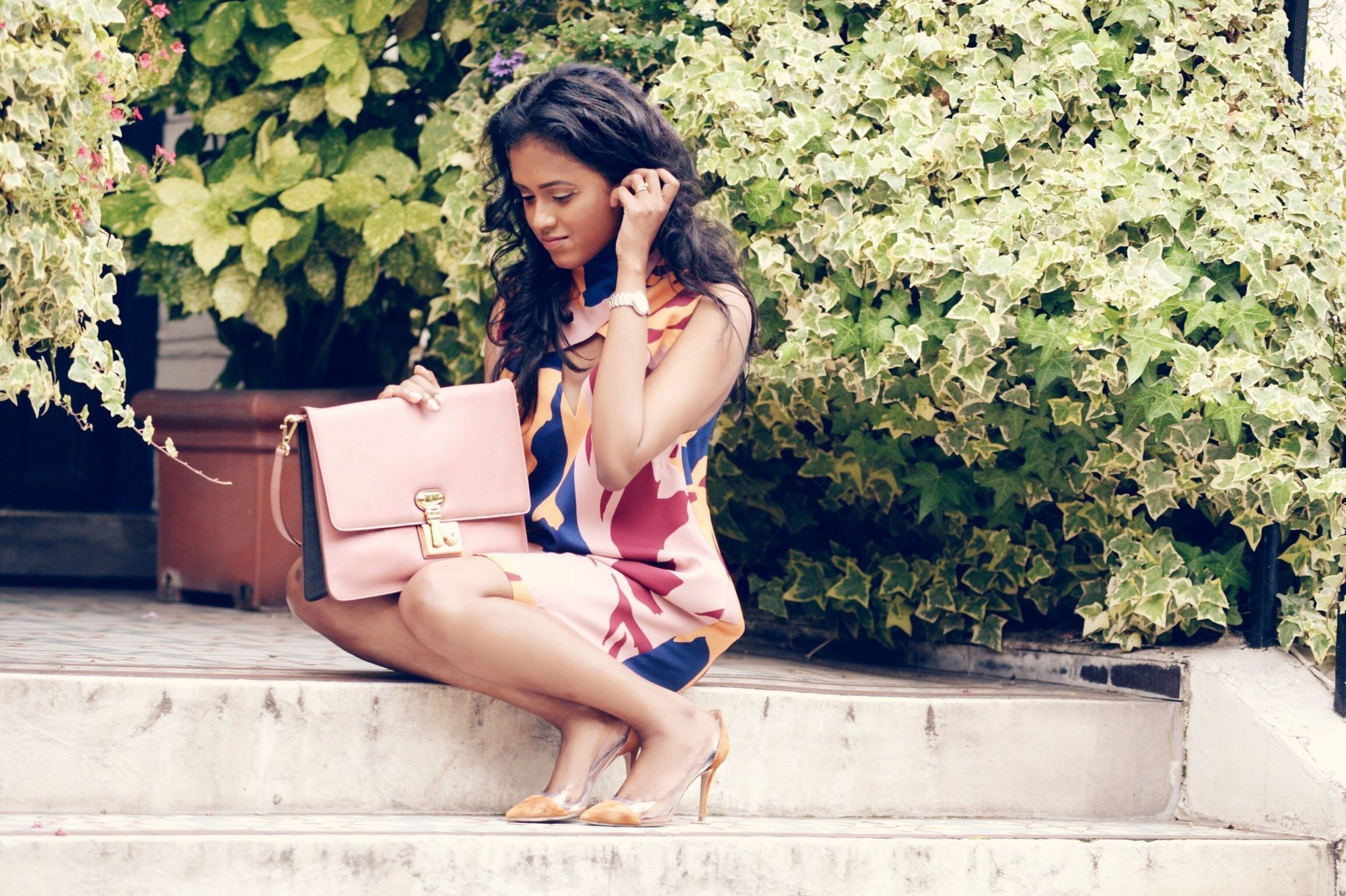 Sachini sitting on stairs