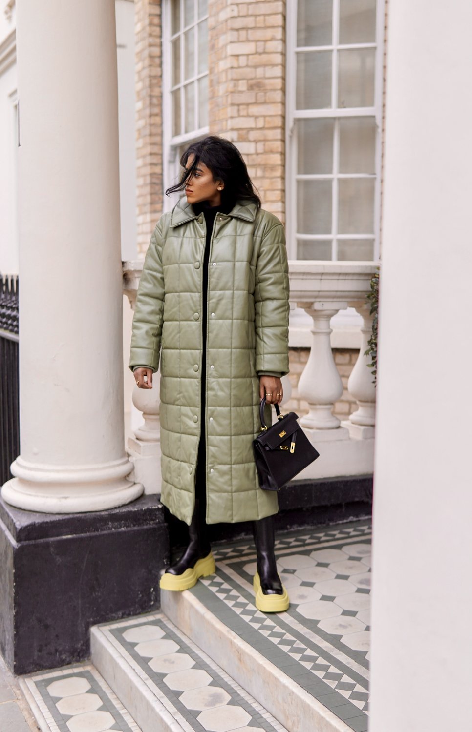 Sachini wearing River Island puffer coat