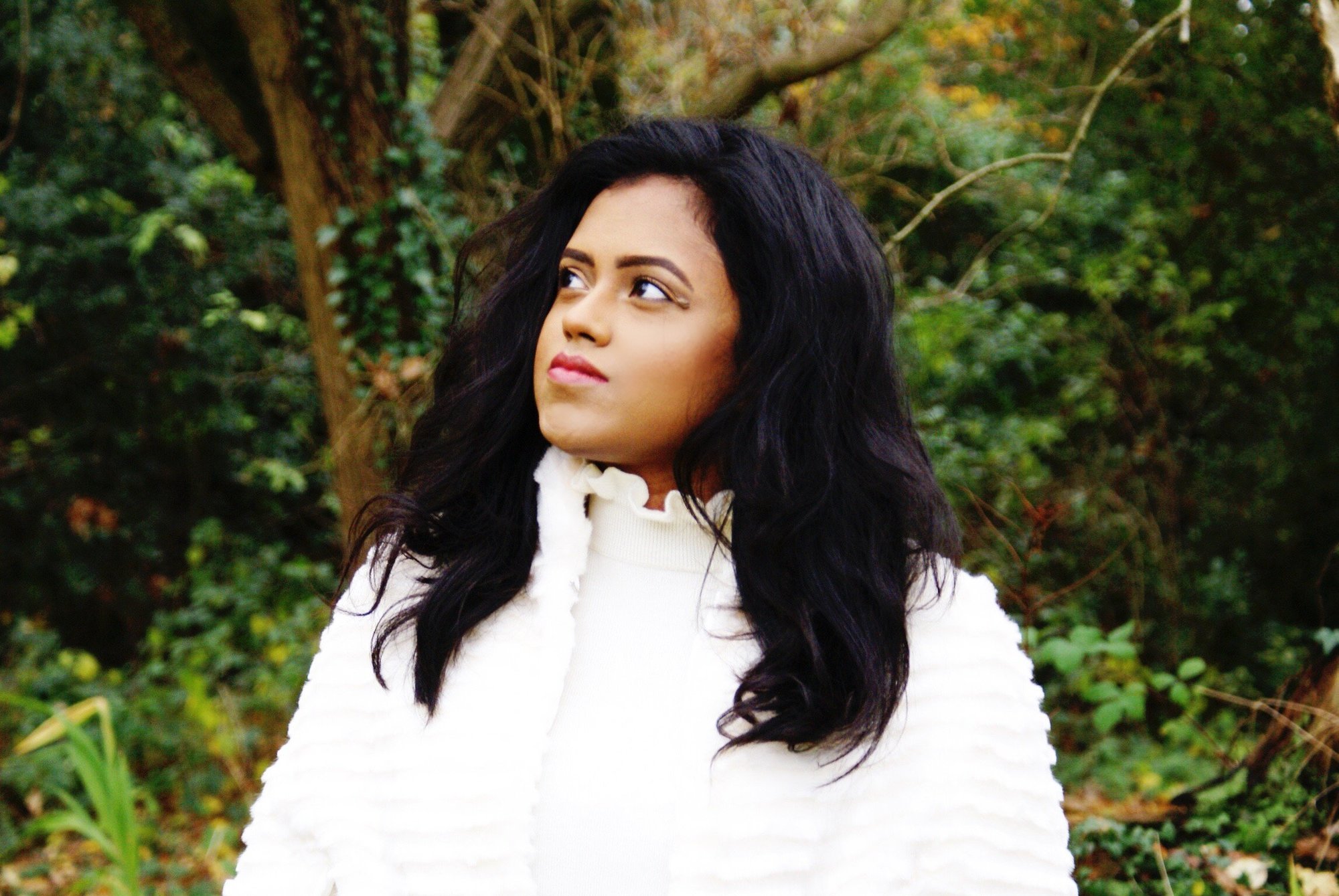 Sachini wearing a white jacket outdoor