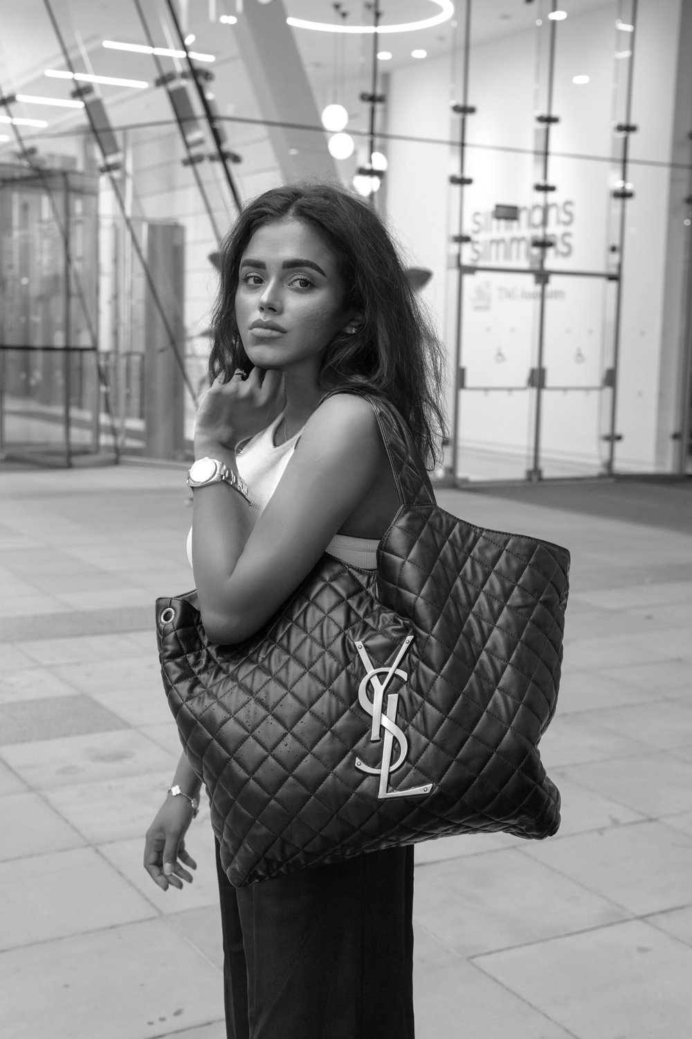 Sachini wearing Saint Laurent tote bag