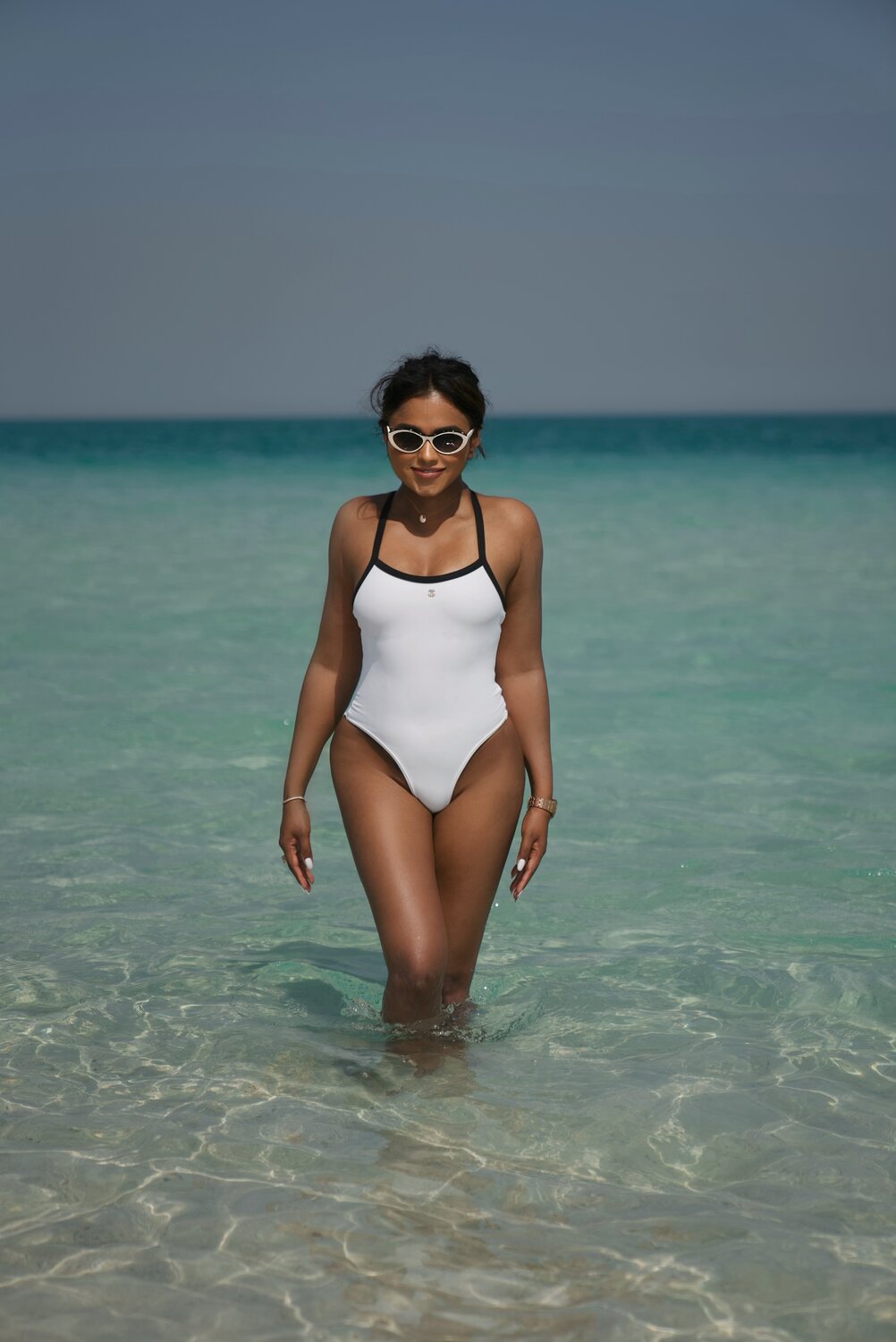Sachini Dilanka wearing a Chanel swimsuit