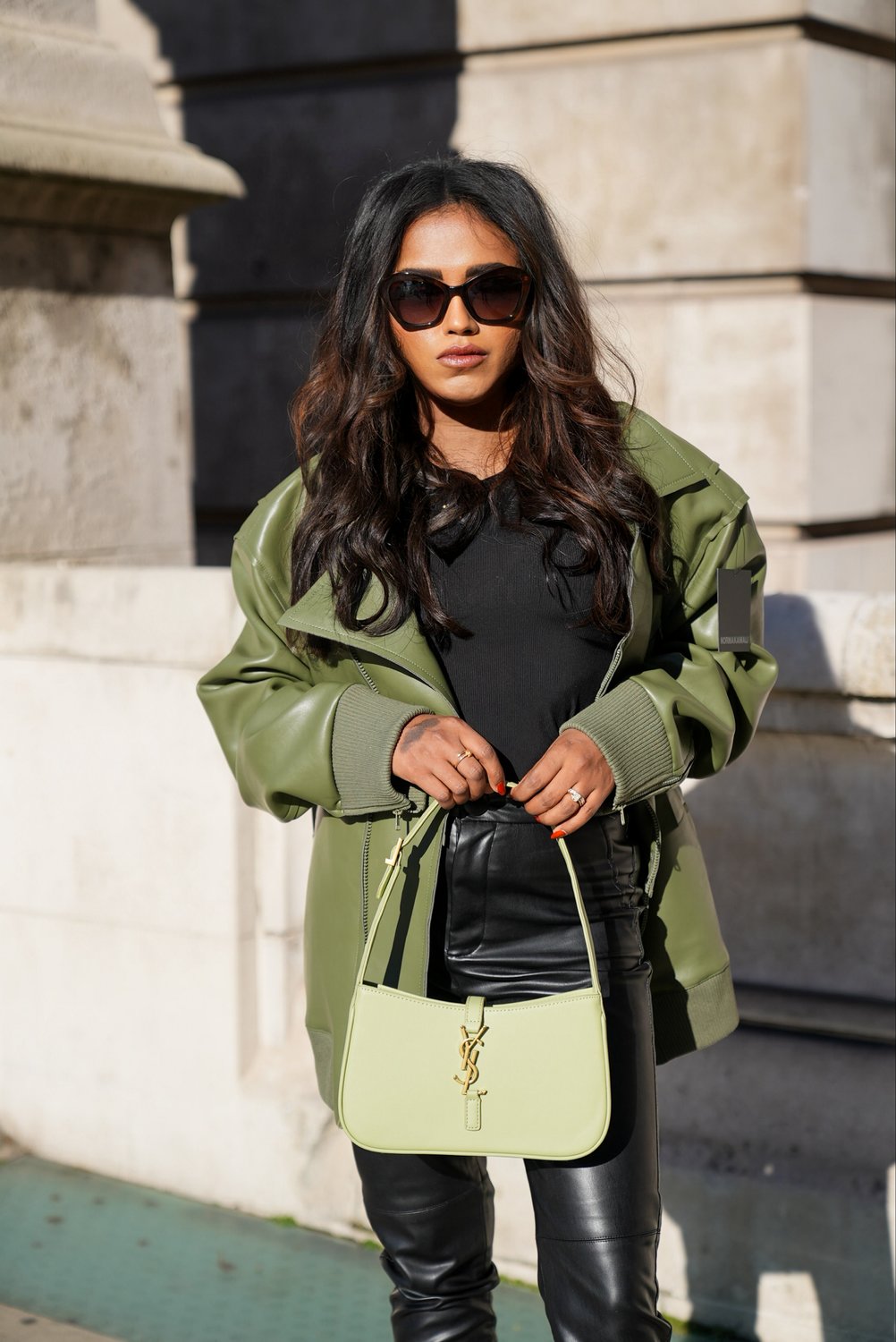 Sachini wearing Norma Kamali Jacket in Green